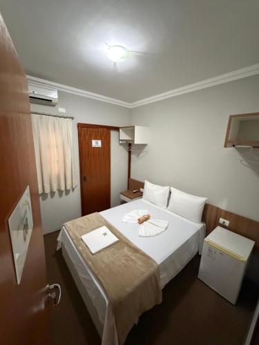 Quarto Duplo com cama de casal, ar-condicionado e frigobar